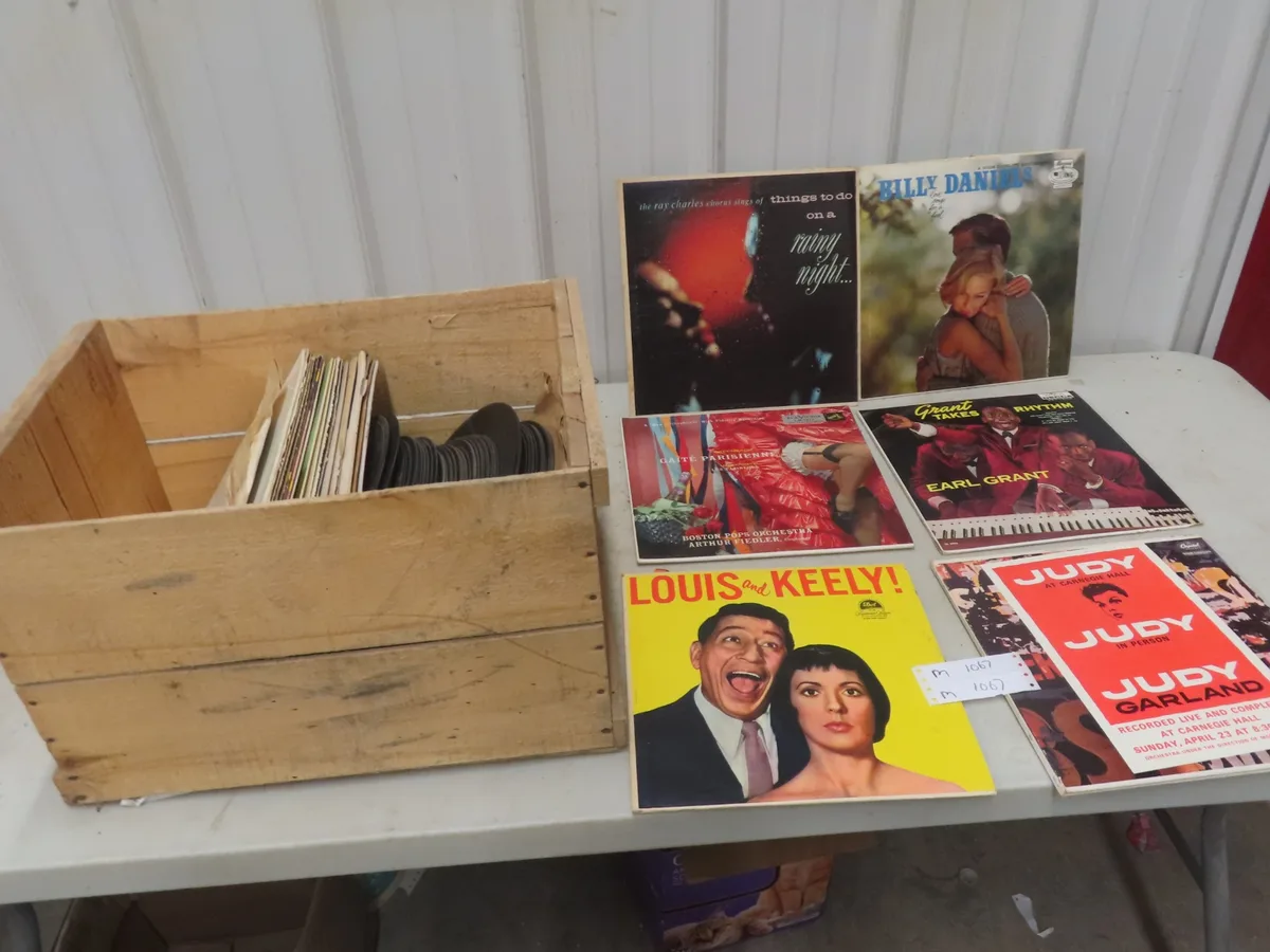 Wooden crate of records from a completed coastal home sale
