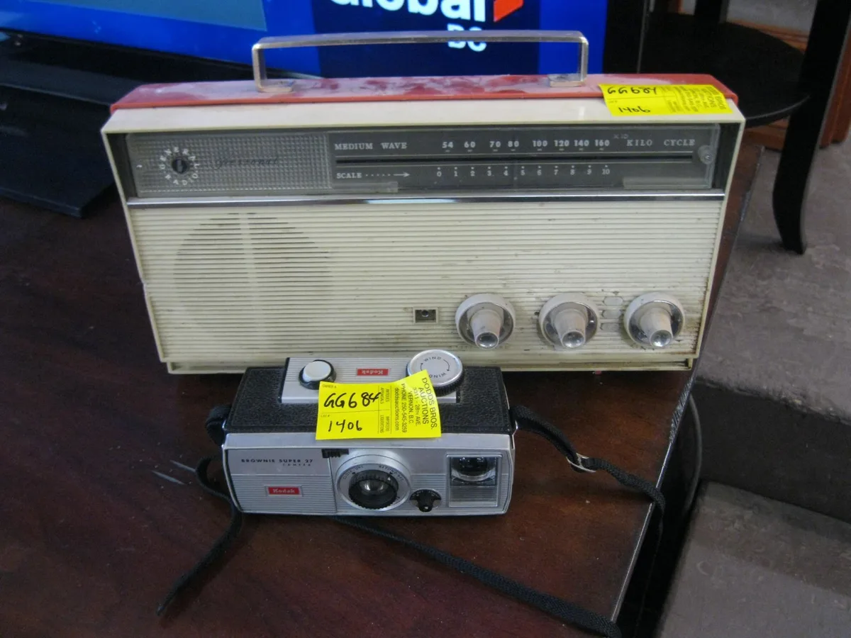 Vintage tabletop radio and Brownie camera