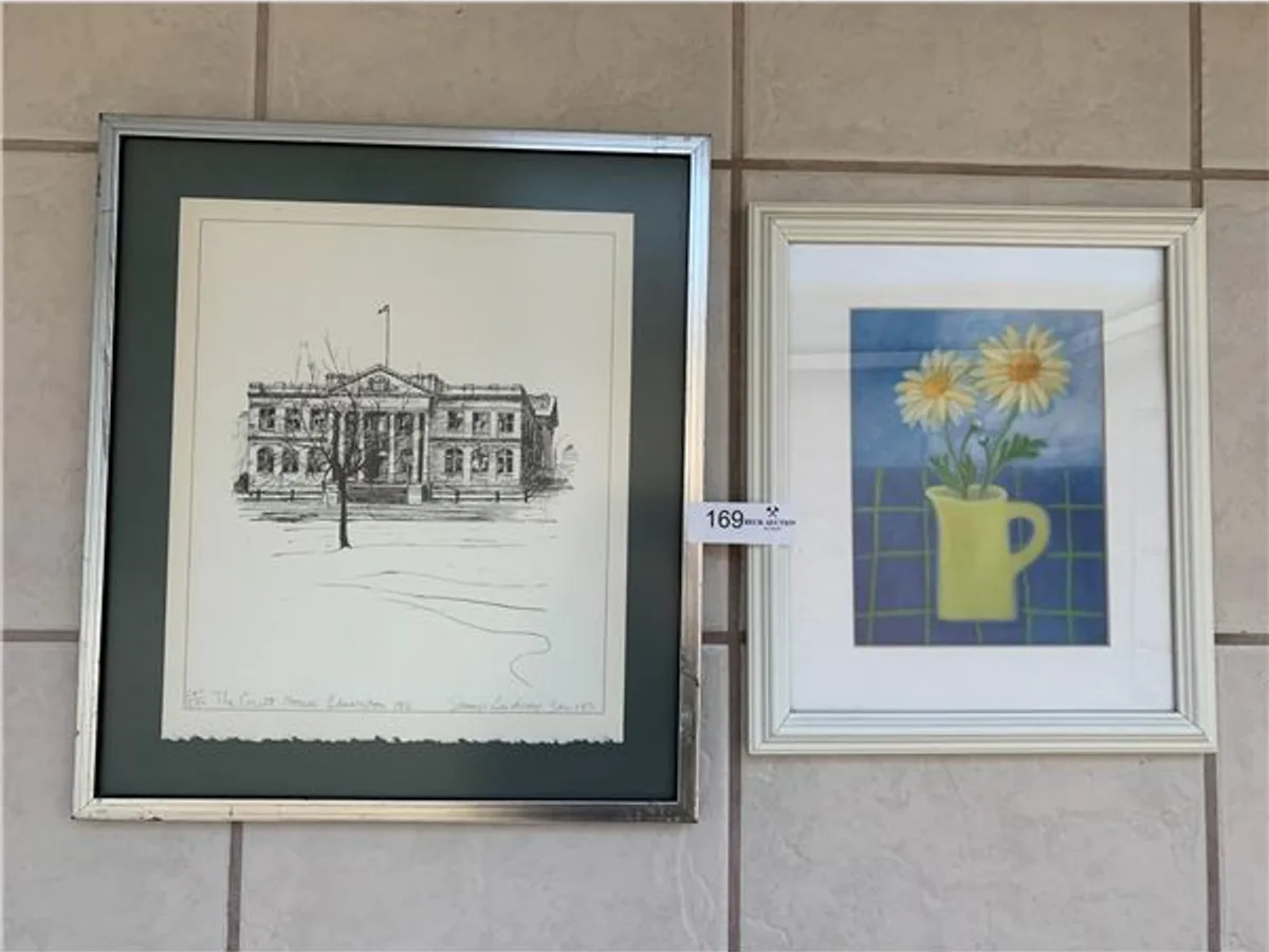 Framed courthouse sketch and floral print