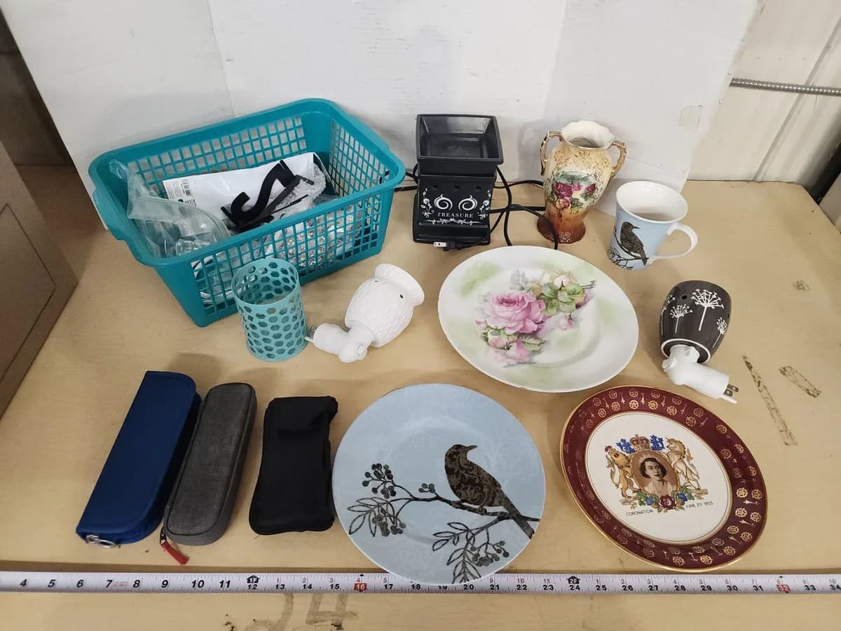 Assorted small household décor and decorative plates